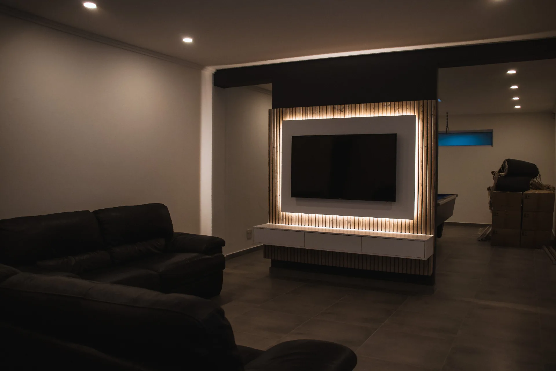 Finished basement with entertainment room and custom lighting in Ashtabula County Ohio