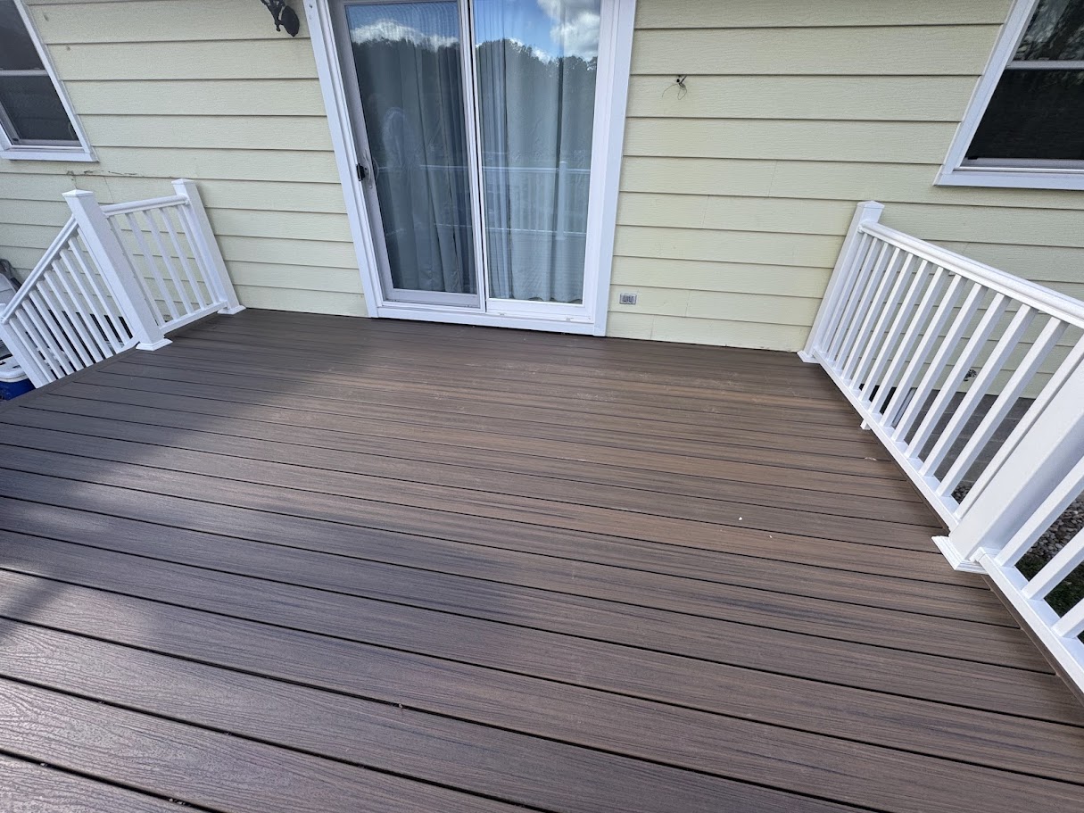 Close-up of premium composite decking material showing wood-grain texture and durability